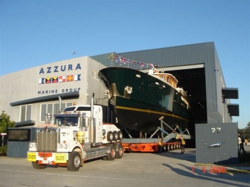 The awesome 30.0-metre superyacht built by Iain Murray’s Azzura Marine, leaving the plant for the short road trip down Waterways Drive to <br />
the Coomera River. © courtesy of the enterprises .